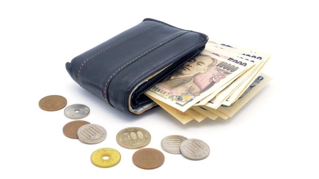 isolated-old-used-leather-wallet-coins-and-bank-notes-picture-id483686798-1024x576